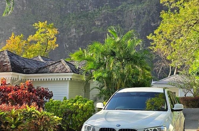 Airport Transfer to Secrets Resort and Spa (Round Trip) - Comfort in the Car: Water, Beer, and a Better Vibe