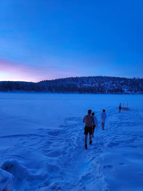 Arctic Tent Sauna Experience with Ice Swimming - Ice Swimming in the Prepared Hole: Safety and Getting Through It