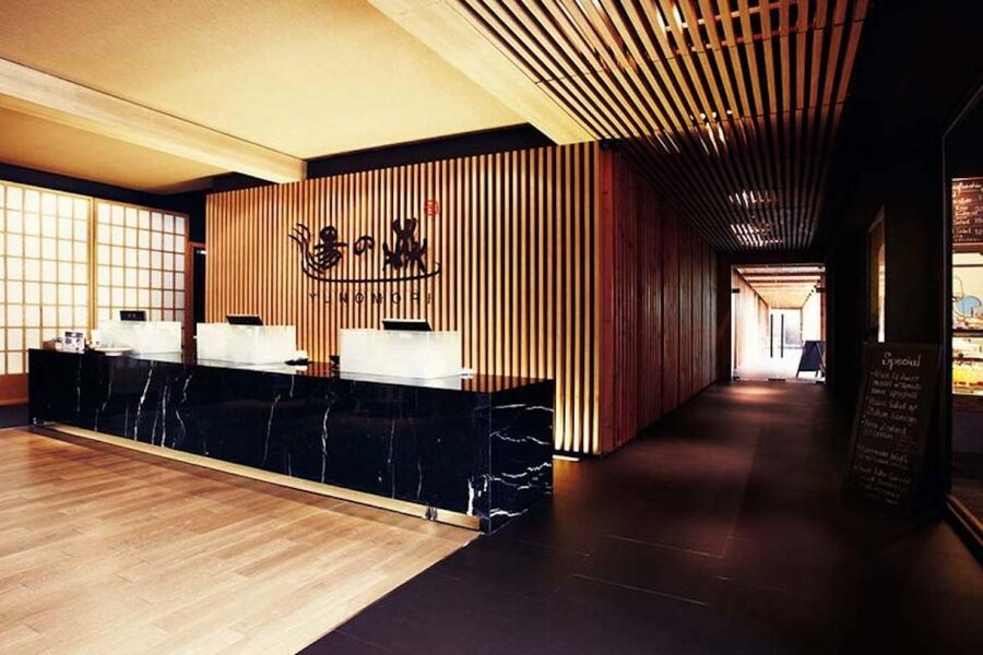 Bangkok: Yunomori Sukhumvit Onsen Hot Springs Spa Pass - Getting checked in: voucher at the lobby reception