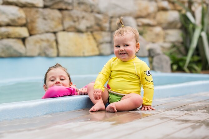 Polynesian Spa Rotorua: Family Hot Pools and Freshwater Pool - The kid-first pool setup: big swimming area plus hydro slide fun