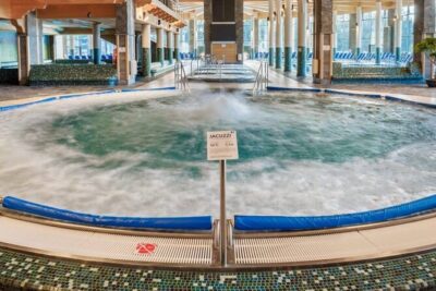 Zakopane Day Tour with Hotel Pick up and Optional Thermal Spa - Chocholow village stop: quick, iconic, and worth slowing down for